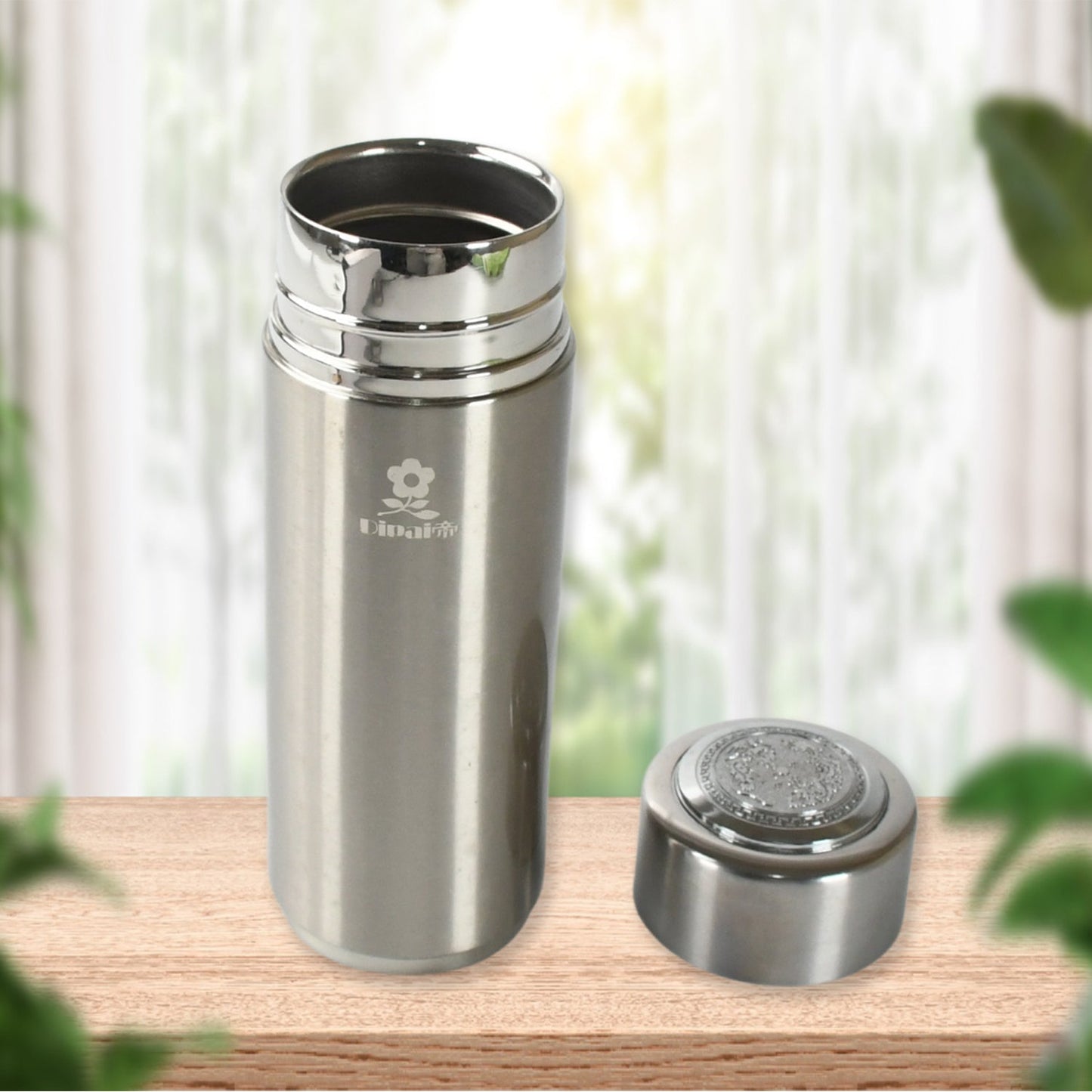 Hot and cold vacuum flask for office or travel use.