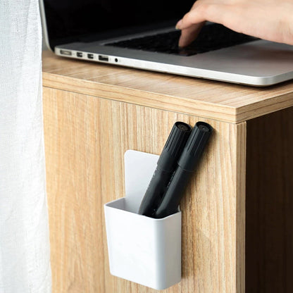 Wall-mounted holder for charging and storage.