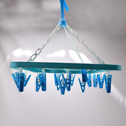 Portable cloth hanger with rotatable clips, square design