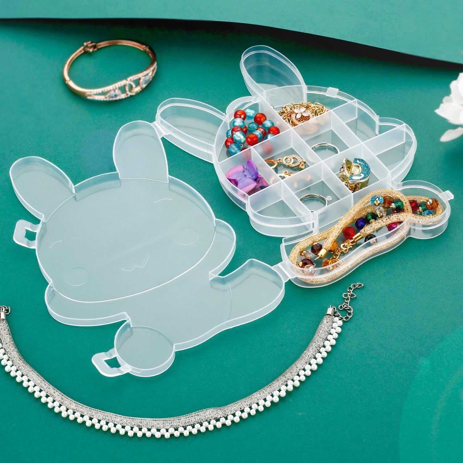 Transparent plastic box with cartoon bear design.