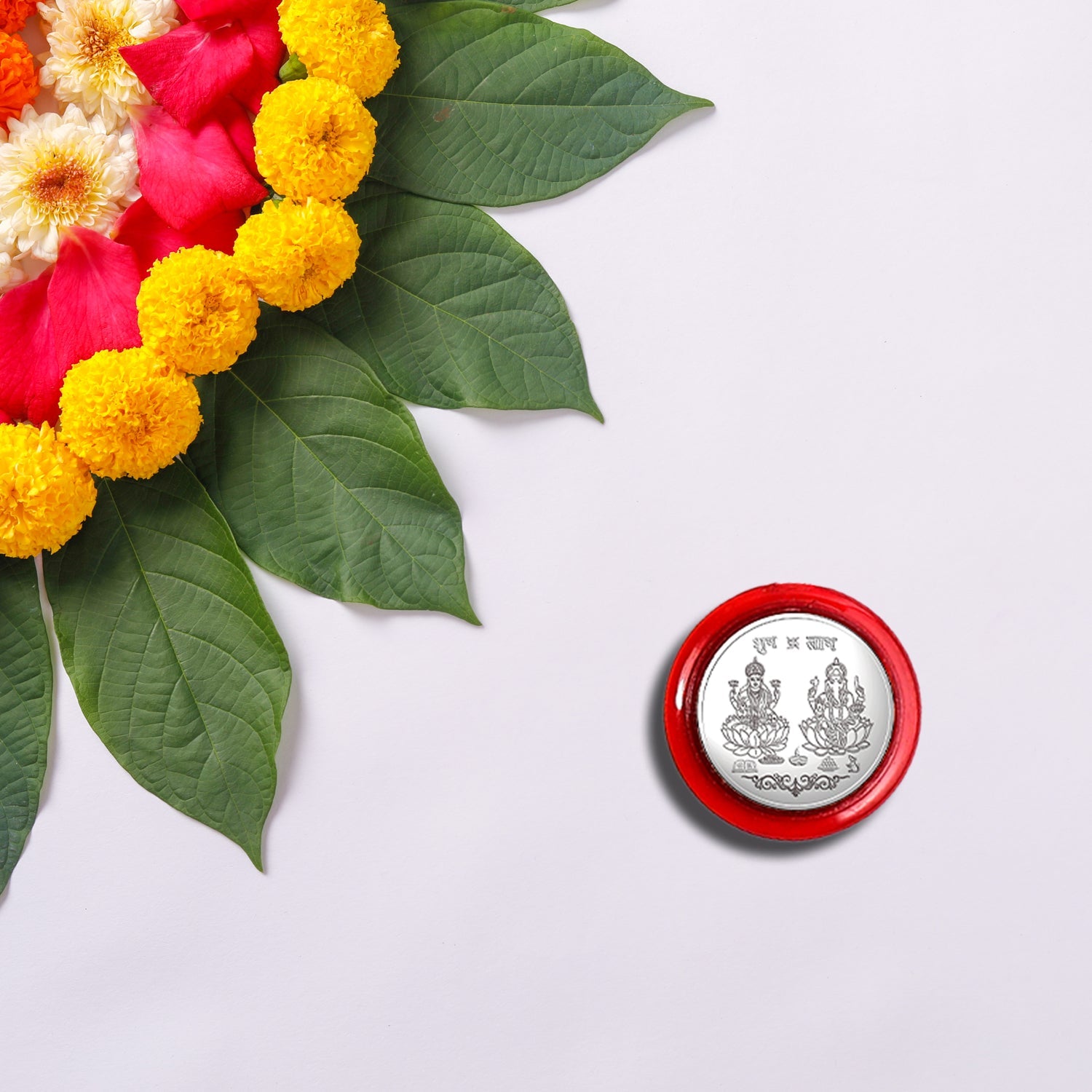 Silver gift coin with Maa Laxmi and Ganesh Ji