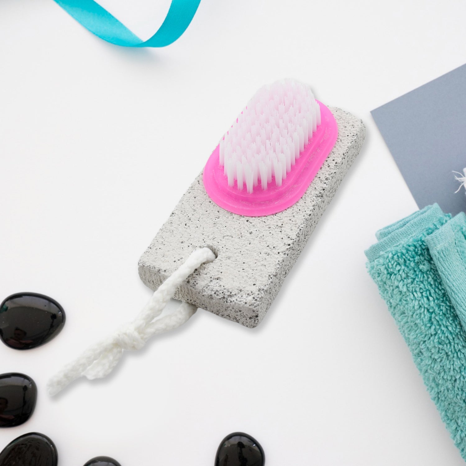 Hand and foot brush with pumice stone for removing dead skin and calluses.