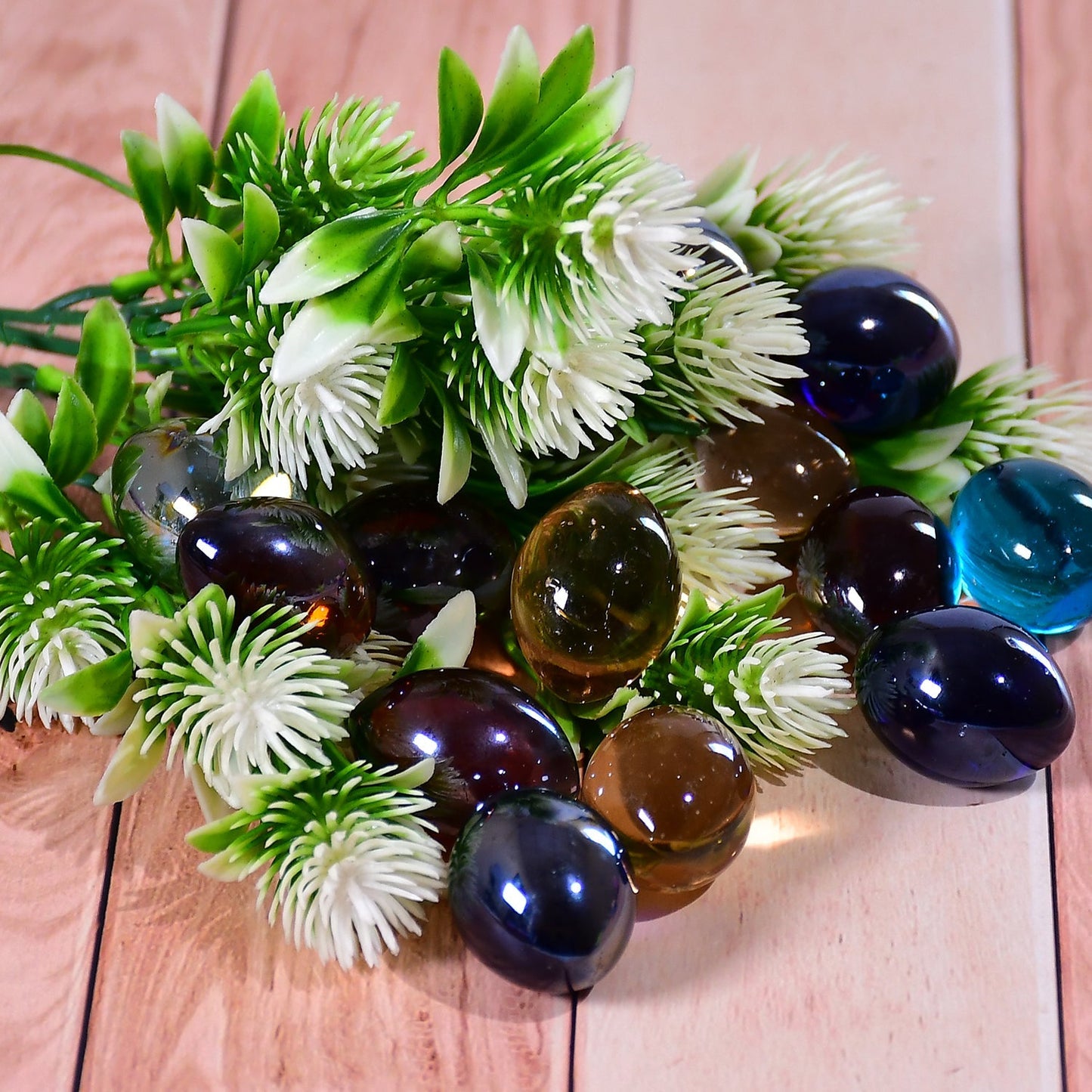 Colorful glass pebbles for vases