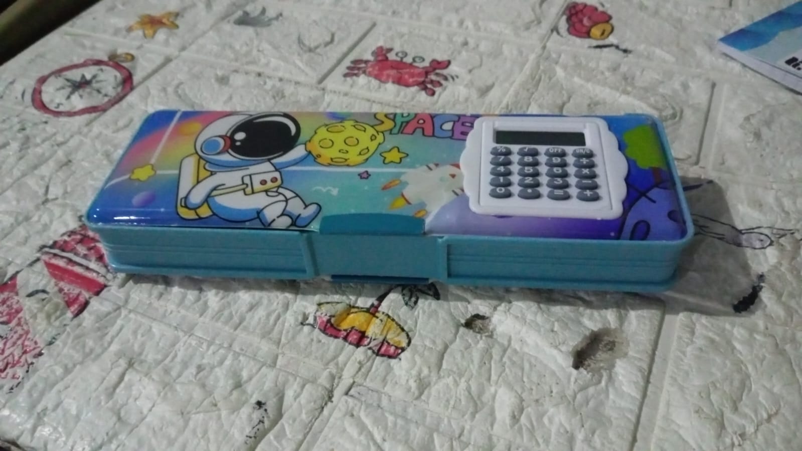 Double-sided plastic pencil box with calculator and art supplies