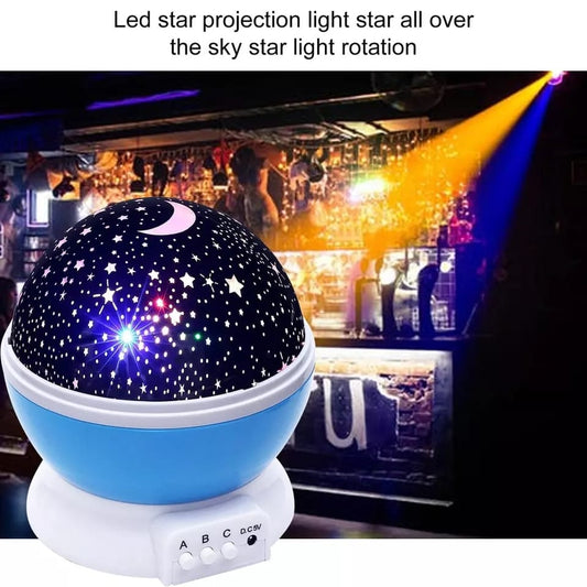 Rotating projection night lamp with star patterns