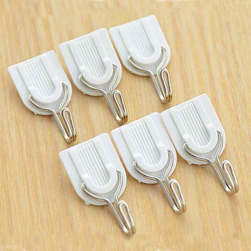 Self-adhesive plastic hook for towels.